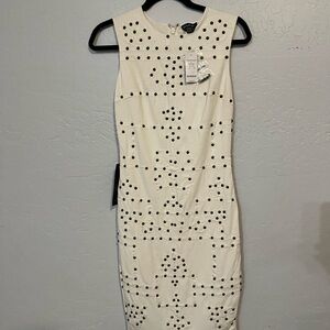 BEBE EMBELLISHED PONTE MIDI DRESS
ROBE MIDI PONTE ORNÉE Size S